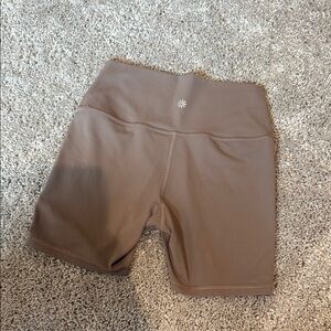 Light brown Athleta biker shorts